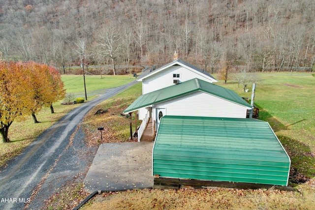 exterior space with a yard