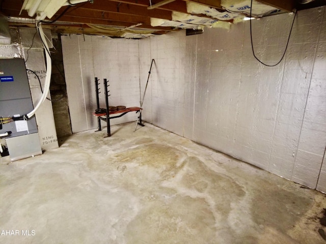 basement featuring heating unit