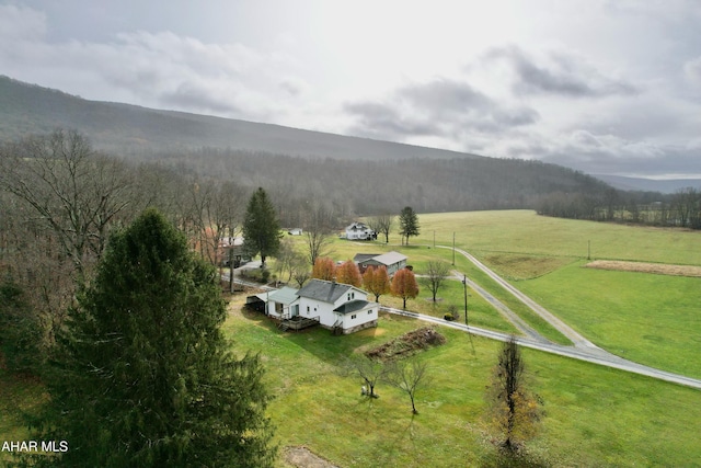 bird's eye view featuring a mountain view and a rural view