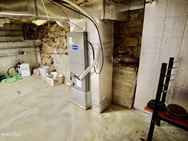 utility room with heating unit