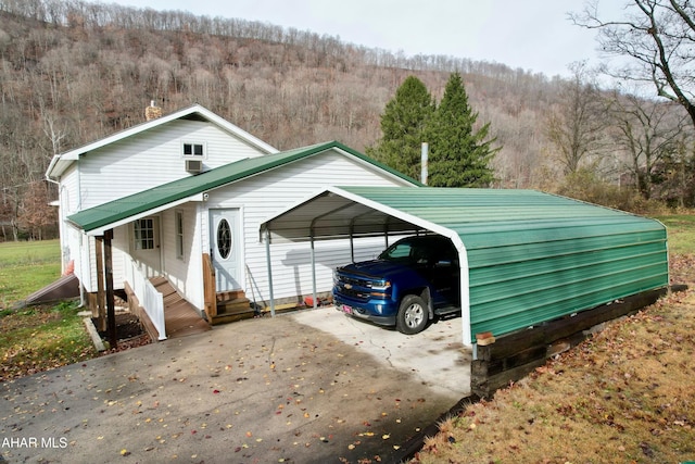 view of front of house with a carport