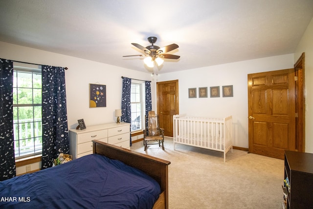 259 Chimney Rocks Rd, Hollidaysburg, PA 16648 - bedroom featuring light colored carpet, a ceiling fan, and baseboards