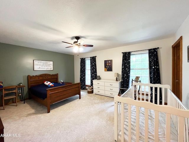 259 Chimney Rocks Rd, Hollidaysburg, PA 16648 - bedroom featuring multiple windows, light colored carpet, and ceiling fan