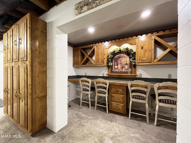 259 Chimney Rocks Rd, Hollidaysburg, PA 16648 - bar featuring unfinished concrete flooring and built in study area