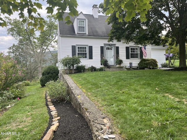 cape cod house with a front lawn