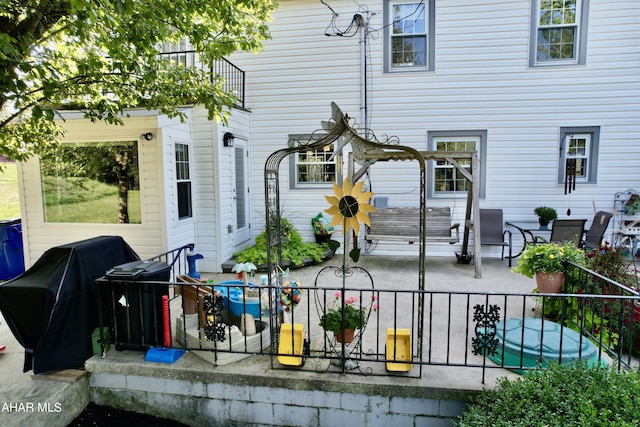 back of house with a patio