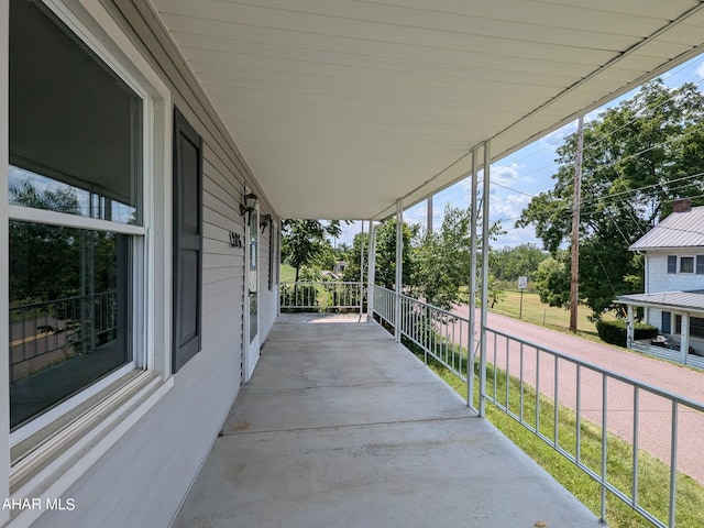 view of patio featuring a porch