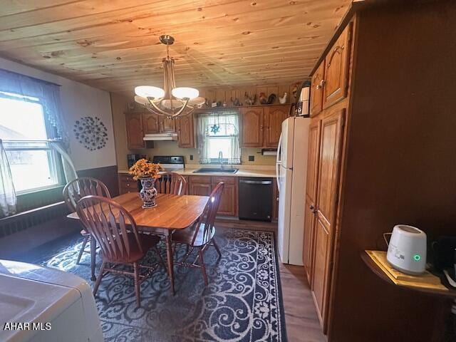 193 Pavia Rd, Imler, PA 16655 - dining space featuring wood ceiling, healthy amount of natural light, a chandelier, and a wainscoted wall