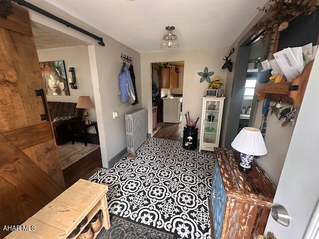 193 Pavia Rd, Imler, PA 16655 - hallway featuring radiator heating unit