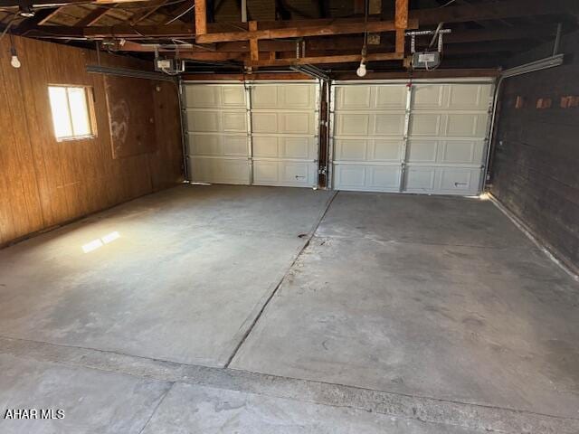 garage with wood walls