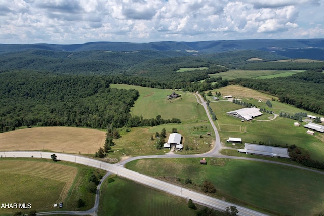 aerial view with a mountain view and a rural view