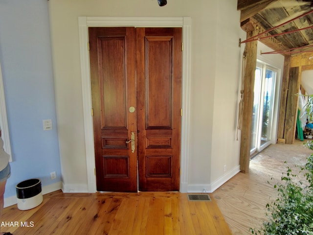 hall featuring light wood-type flooring