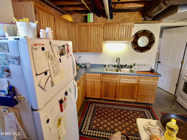 kitchen with sink and white appliances