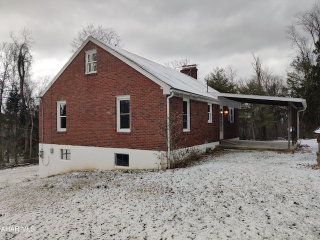 view of snow covered property