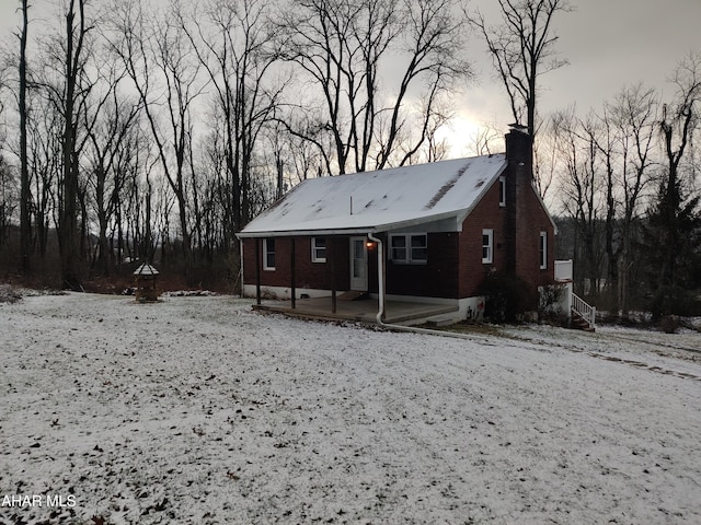 view of snow covered property