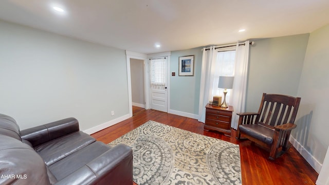 sitting room featuring recessed lighting, baseboards, and wood finished floors