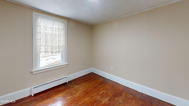 143 Rider Farm Rd, Altoona, PA 16601 - unfurnished room featuring baseboard heating and dark wood-style flooring