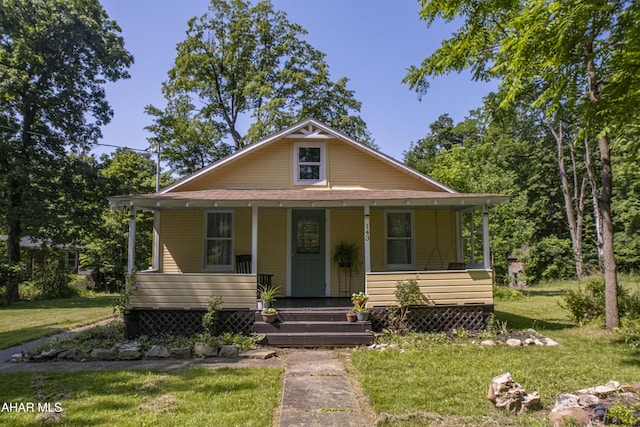 143 Rider Farm Rd, Altoona, PA 16601 - bungalow-style house featuring a porch and a front lawn