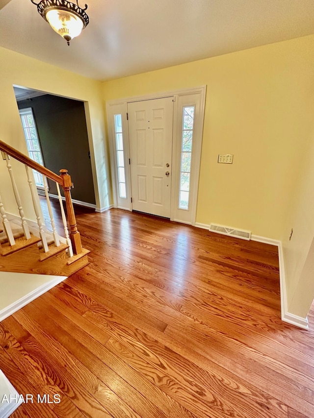 entrance foyer with light hardwood / wood-style floors