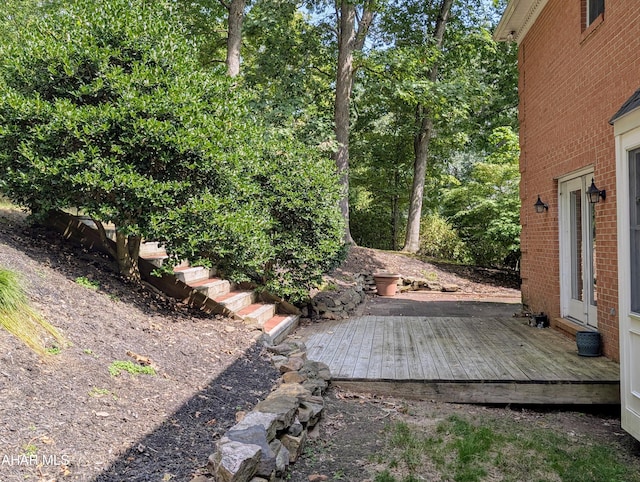 view of yard with a deck