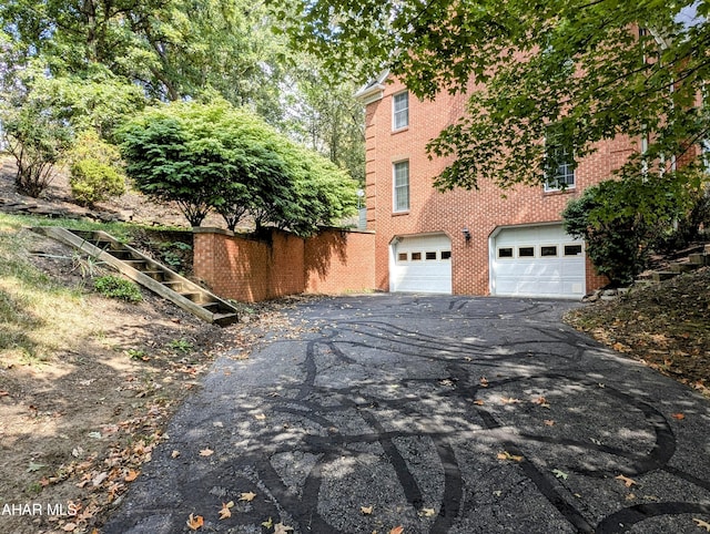 view of home's exterior with a garage