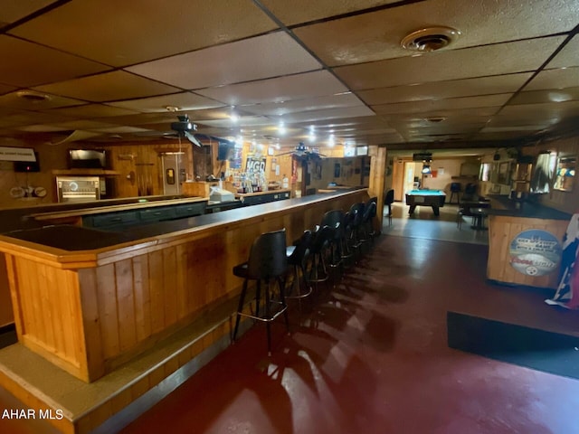 bar with a drop ceiling and pool table