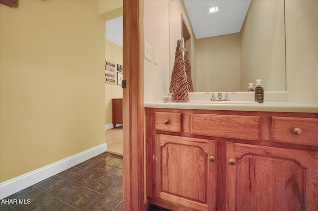 bathroom featuring tile patterned floors and vanity