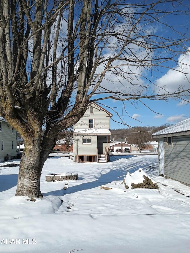 view of yard covered in snow