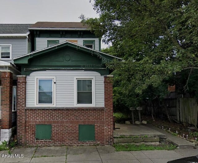 view of side of home featuring a patio area