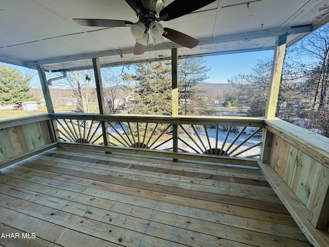 wooden terrace with ceiling fan