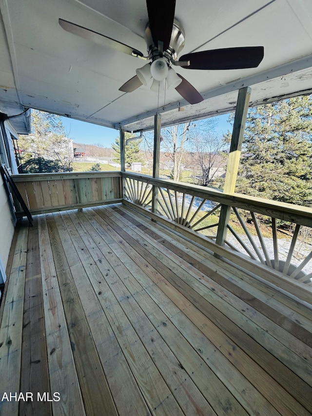 wooden terrace with ceiling fan