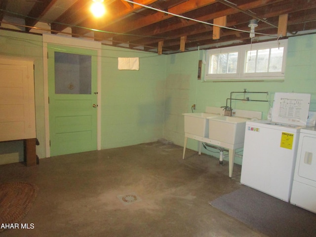 basement with separate washer and dryer