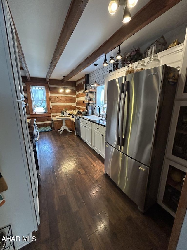 3776 Warriors Mark Path, Warriors Mark, PA 16877 - kitchen featuring stainless steel appliances, dark wood finished floors, white cabinetry, rustic walls, and beam ceiling