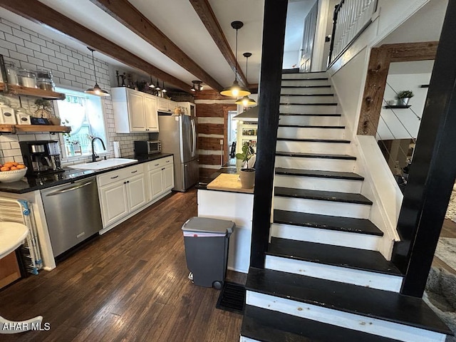3776 Warriors Mark Path, Warriors Mark, PA 16877 - stairway featuring wood finished floors, wooden walls, and beamed ceiling