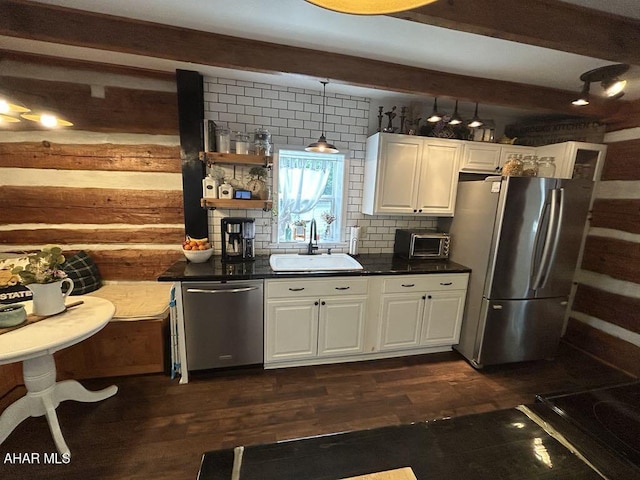 3776 Warriors Mark Path, Warriors Mark, PA 16877 - kitchen featuring appliances with stainless steel finishes, a sink, beamed ceiling, dark countertops, and white cabinets