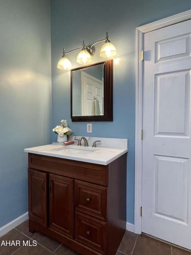 bathroom featuring tile patterned floors and vanity