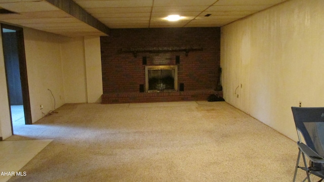 703 Ruskin Dr, Altoona, PA 16602 - unfurnished living room featuring carpet flooring, a brick fireplace, and a drop ceiling