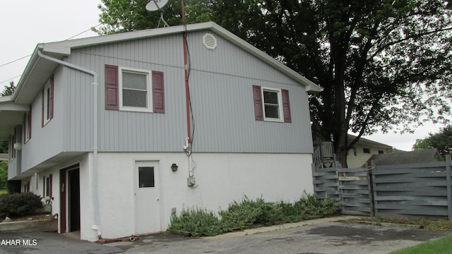703 Ruskin Dr, Altoona, PA 16602 - view of property exterior with stucco siding