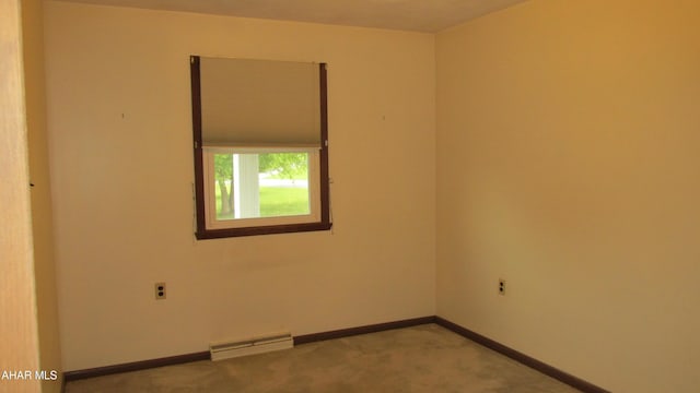 703 Ruskin Dr, Altoona, PA 16602 - unfurnished room with carpet flooring and a baseboard radiator