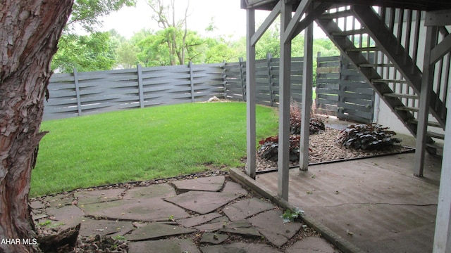 703 Ruskin Dr, Altoona, PA 16602 - fenced backyard with a patio area