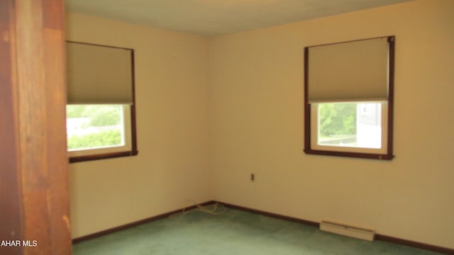 703 Ruskin Dr, Altoona, PA 16602 - unfurnished room featuring baseboard heating and carpet floors