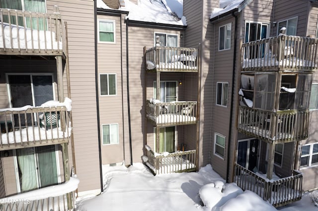 view of snow covered property