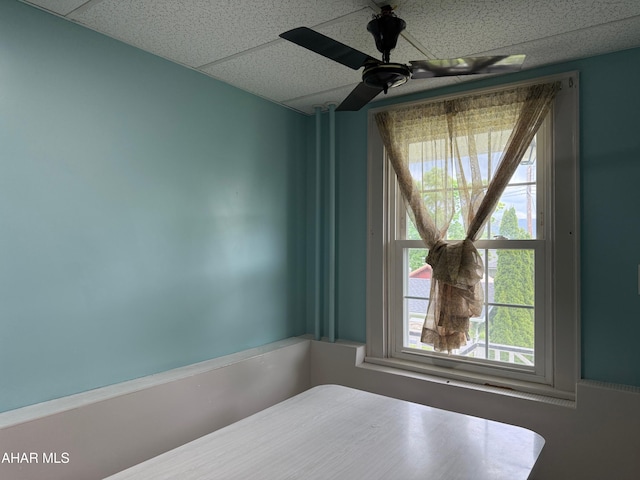bedroom with a paneled ceiling