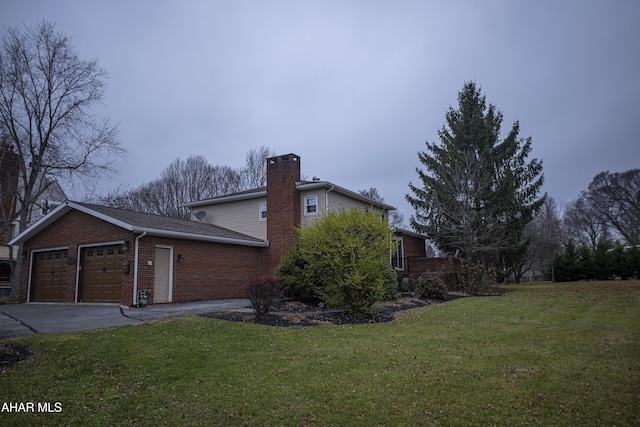 view of property exterior featuring a lawn and a garage