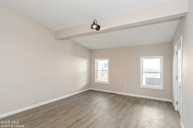 320 2nd Ave, Altoona, PA 16602 - spare room featuring baseboards, beam ceiling, and wood finished floors