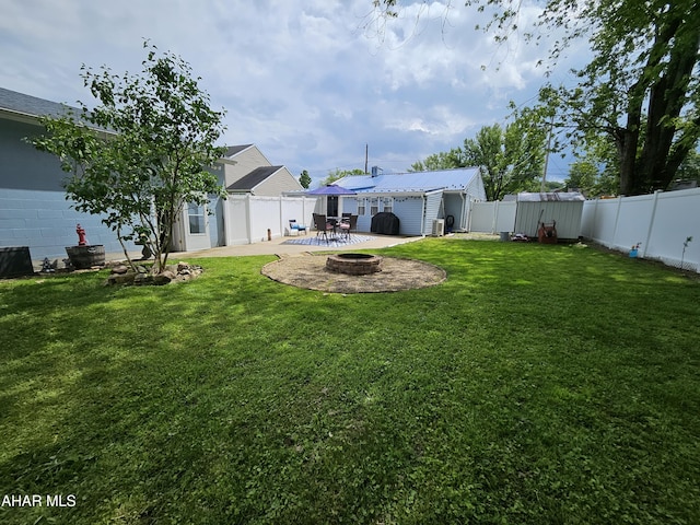 2802 Elm St, Altoona, PA 16601 - rear view of property featuring an outdoor fire pit and a patio area