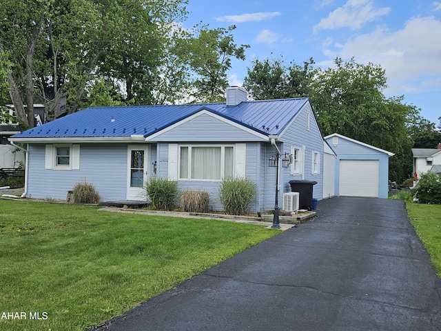 2802 Elm St, Altoona, PA 16601 - ranch-style house featuring a chimney, an outdoor structure, a detached garage, metal roof, and a front yard
