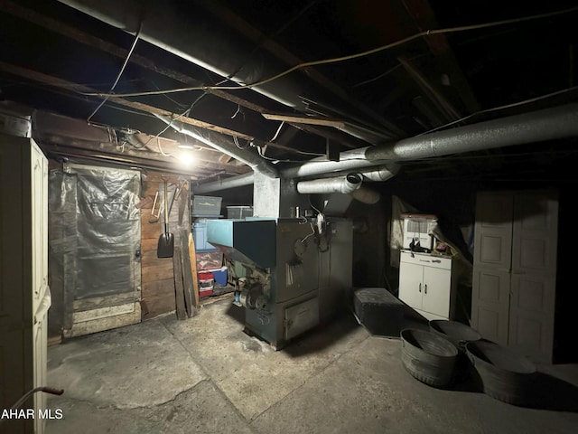 unfinished basement with heating unit