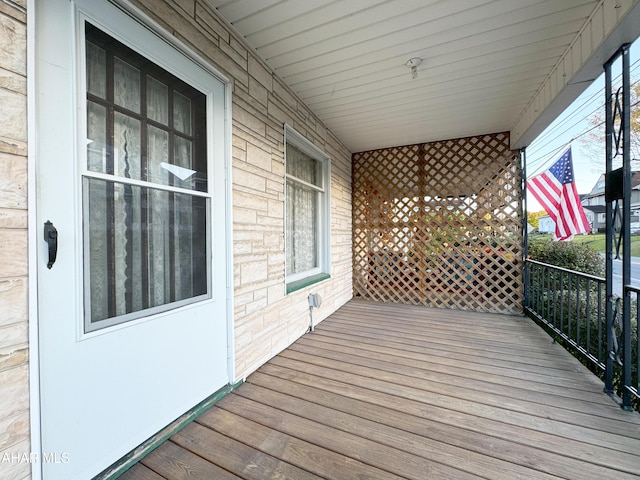 wooden terrace featuring a porch