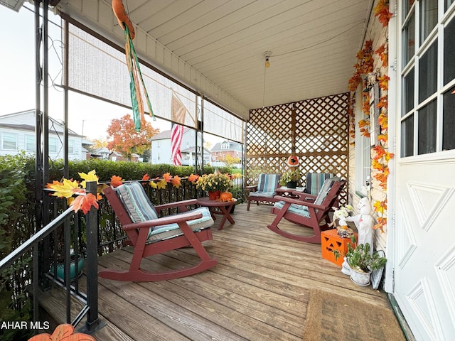 wooden terrace featuring a porch